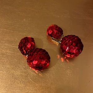 Sequined red clip on party earrings.